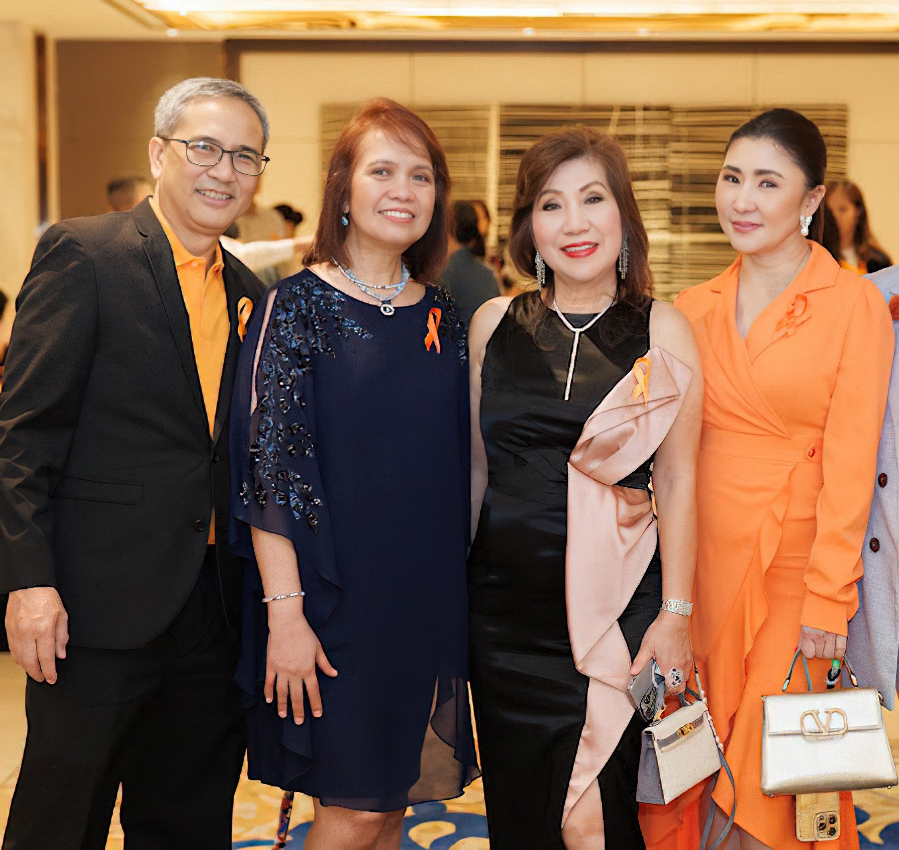 Epcalm’s president Justice Demerre and founder Dr. Erlyn Demerre with Connie Haw and Nikki Tang.