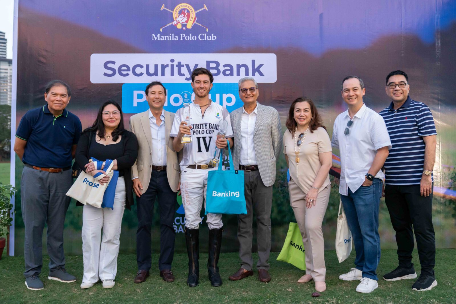 (L-R) Vic Noel, Security Bank Chairman; Michiko Dulay, Security Bank Wholesale Treasury Sales Head; Alex Revilla, Manila Polo Club President; Ignacio O’Dwyer, Professional Polo Player (Argentina); Sanjiv Vohra, Security Bank President and CEO; Diana Aguilar, Security Bank Vice Chairperson; Jim Yap, Security Bank SVP and Financial Markets Segment Head (OIC); Andre Ibarra, Security Bank Treasurer, at the awarding of the high goal game at the Security Bank Polo Cup.