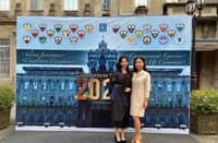 The author (left) and her mother (right), Mai, shares a quiet triumph on graduation day.