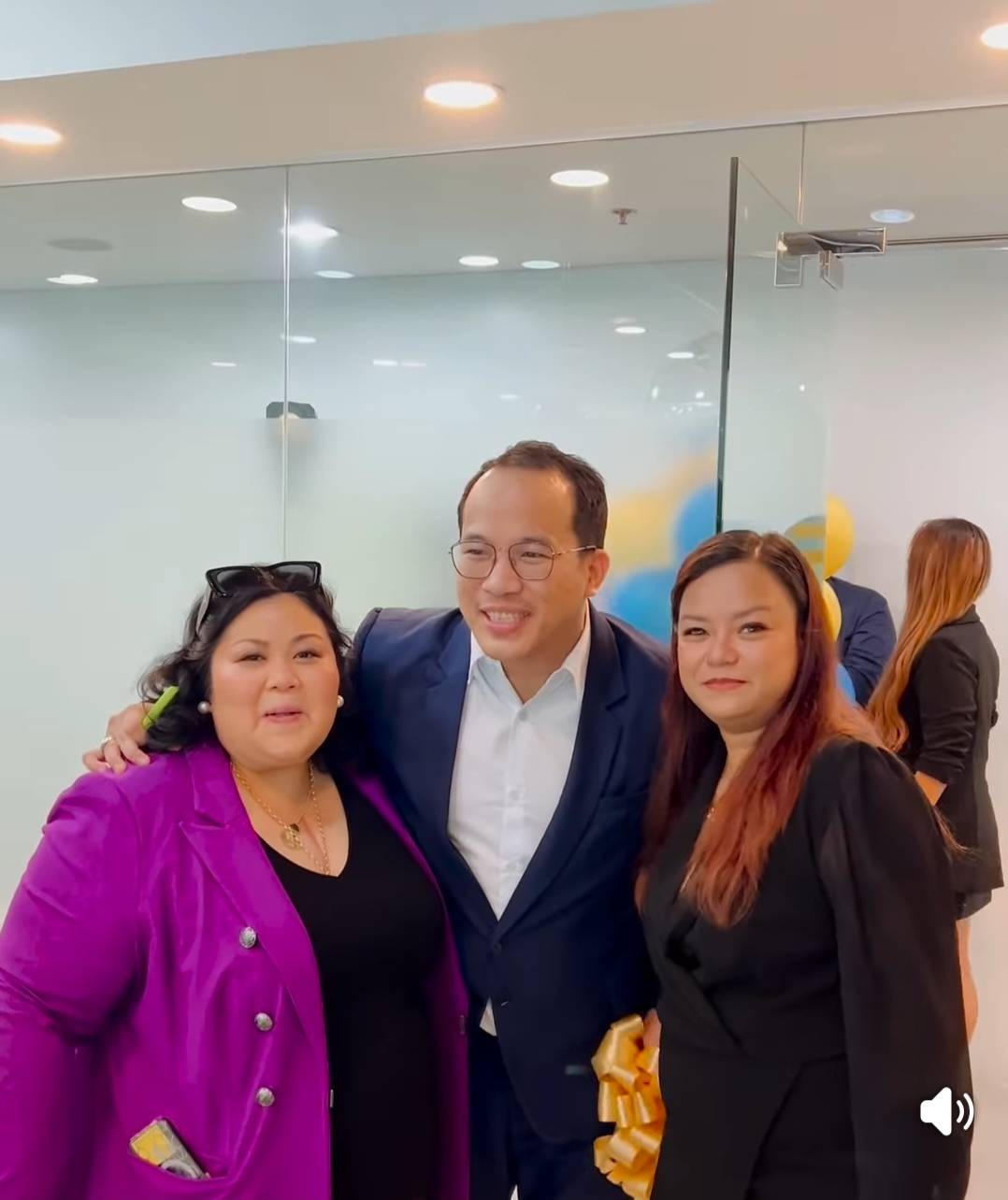 Abigail Selma (left) and Jhona Biscarra (right) with Robin Fallara of Know Your Business at the opening of Toujours BGC office.