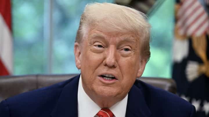 US President Donald Trump makes a trade announcement in the Oval Office of the White House in Washington, DC, on May 8, 2025. US President Donald Trump on Thursday announced a "full and comprehensive" trade agreement with Britain, which would be the first such deal since he launched his global tariffs blitz.