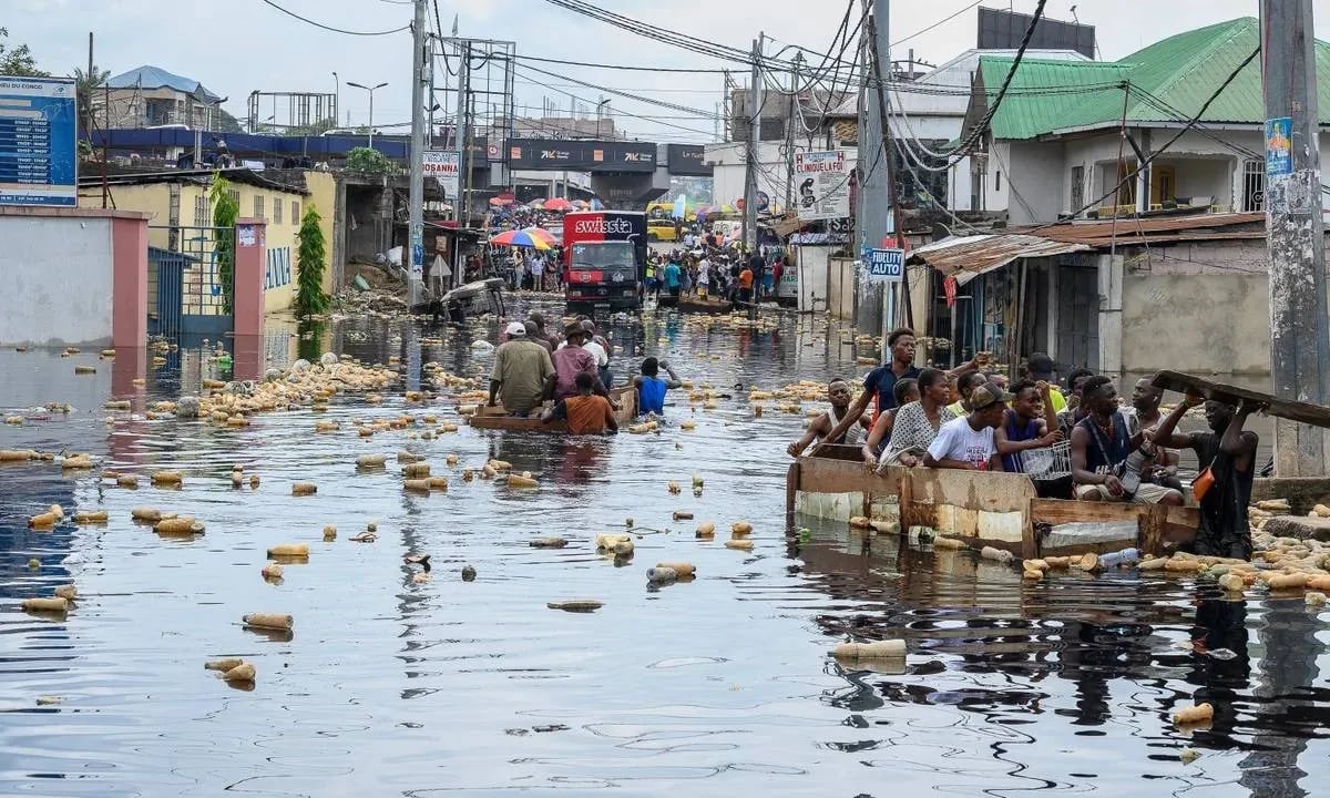 People in Kinshasa’s Pompage district after the Congo River overflowed.