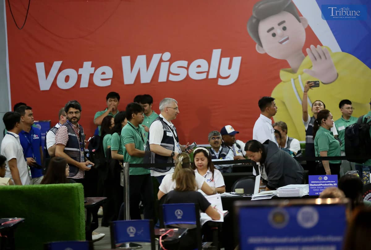 Foreign observers arrive at SM North Edsa in Quezon City on Monday, 12 May 2025, to observe voters casting their ballots during the National and Local Elections.