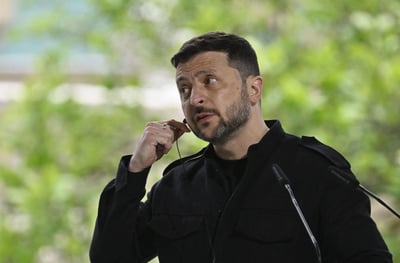 Ukrainian President Volodymyr Zelensky attends a press conference after meeting EU leaders in Kyiv.