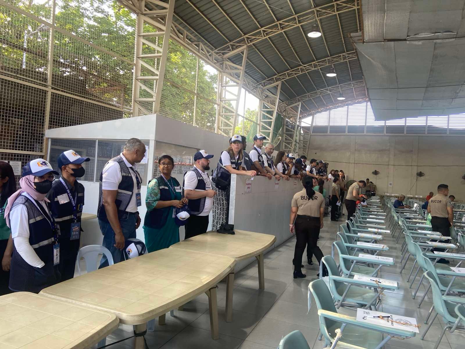 Foreign Observers arrived at Special Polling Precinct at the New Bilibid Prison assisted by Bucor personnel  and Muntinlupa City Election Officers.
