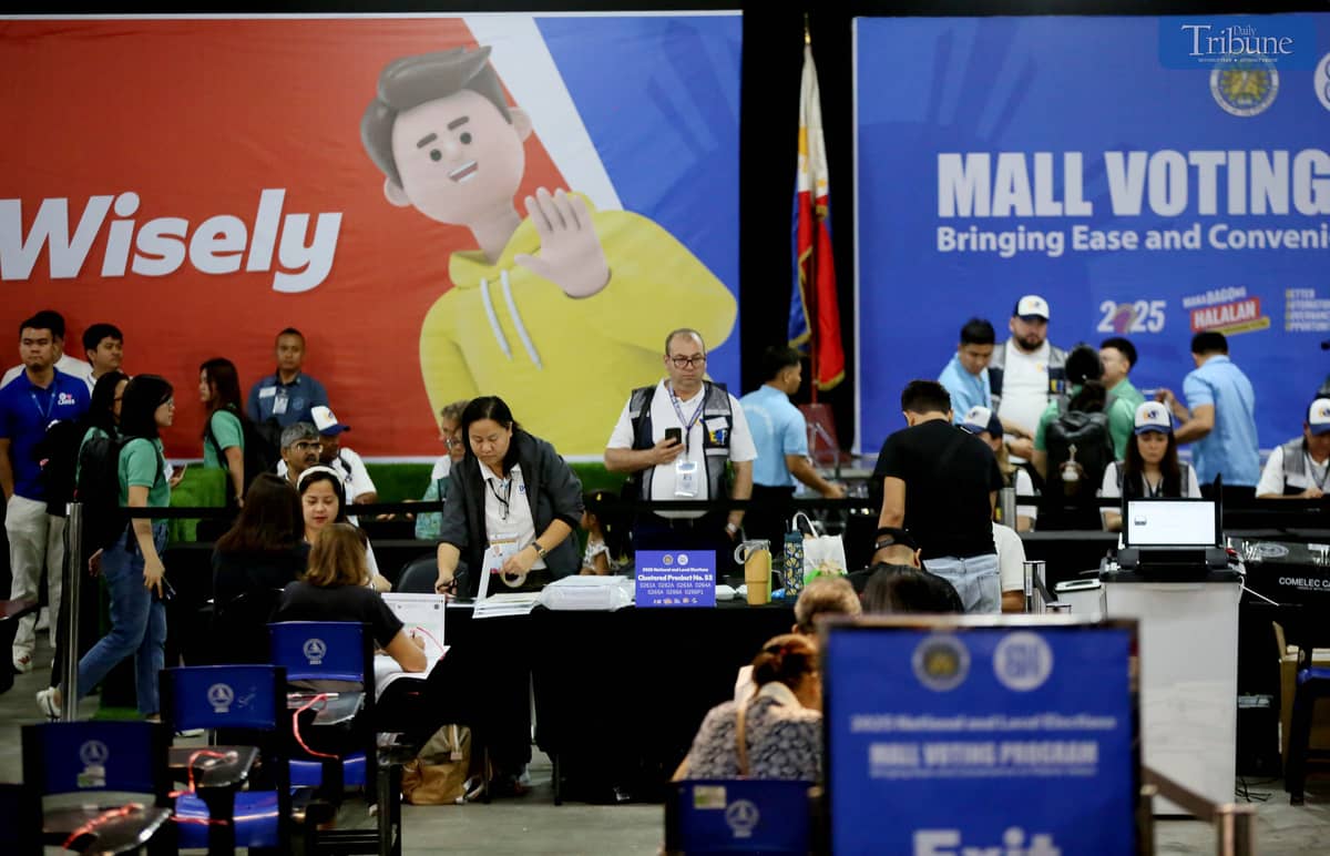 Foreign observers arrive at SM North Edsa in Quezon City on Monday, 12 May 2025, to observe voters casting their ballots during the National and Local Elections.
