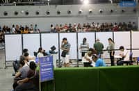 Foreign observers arrive at SM North Edsa in Quezon City on Monday, 12 May 2025, to observe voters casting their ballots during the National and Local Elections.