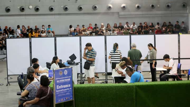 Foreign observers arrive at SM North Edsa in Quezon City on Monday, 12 May 2025, to observe voters casting their ballots during the National and Local Elections.