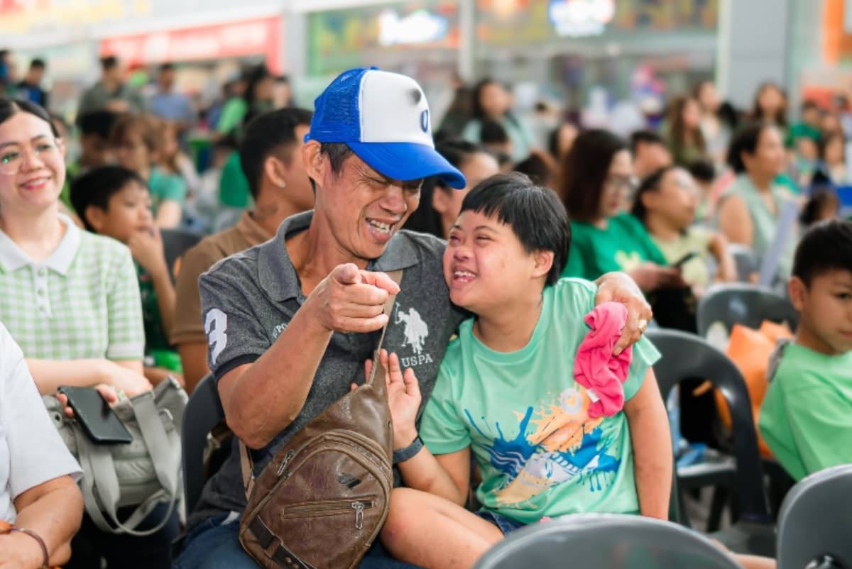 A touching moment between father and son during the ASP Angels Walk — a powerful reminder of the importance of a community embracing neurodiversity.