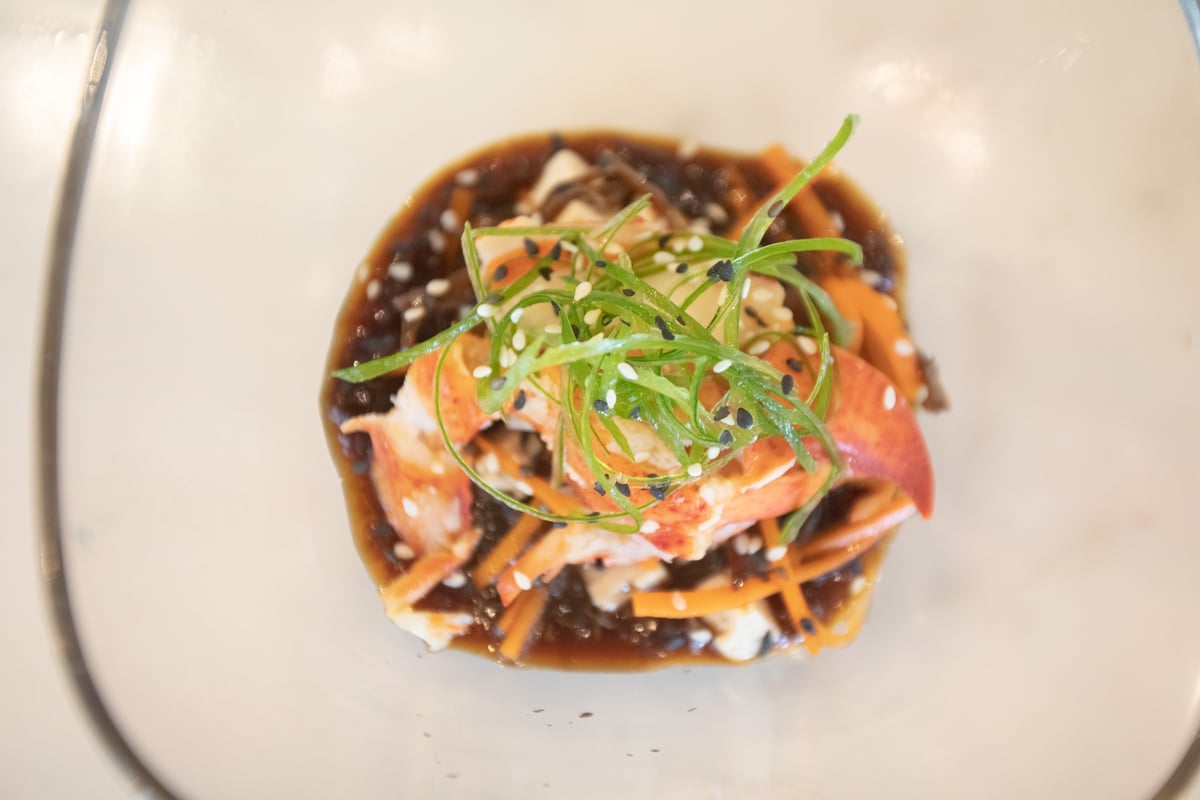 A dish from Flame’s current quarterly tasting menu: Lobster, tofu and wood ear mushrooms suspended in a chilled hot and sour gelée.