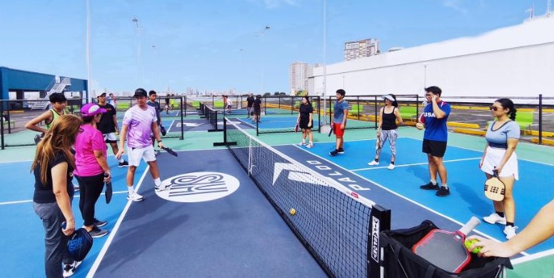 Players learn the fundamentals of pickleball at a free pickleball clinic at SM City Sta. Mesa.
