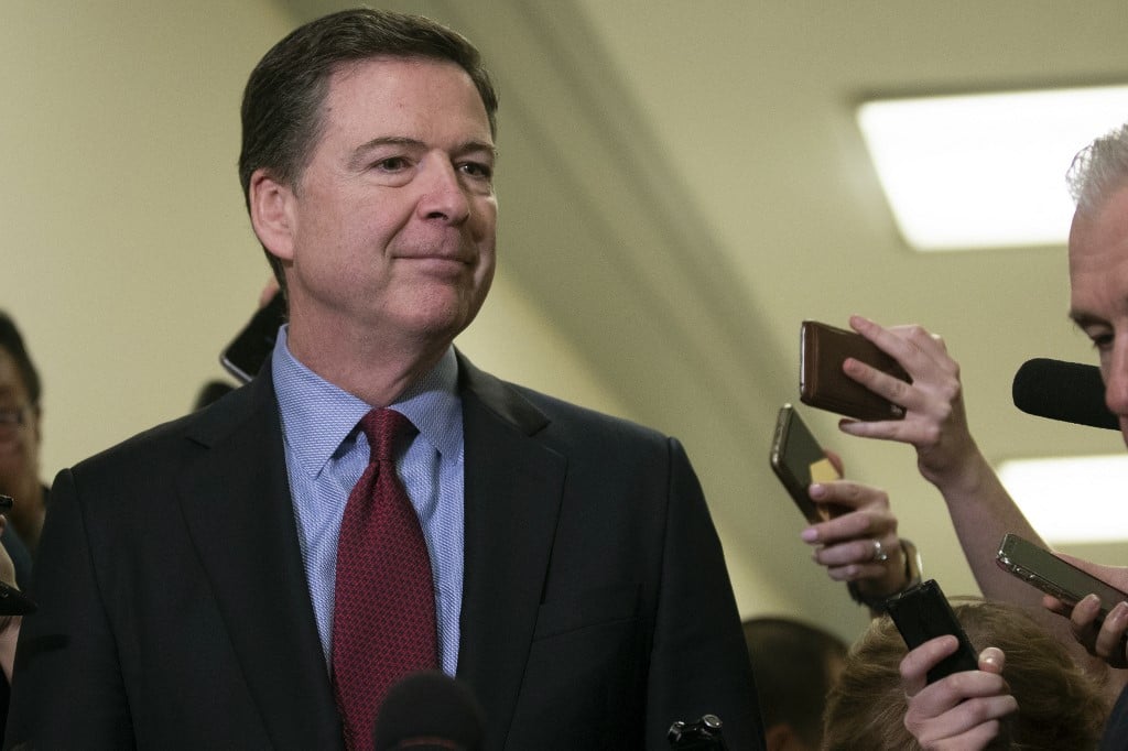 U.S. probes Trump 'threat' by ex-FBI chief Comey