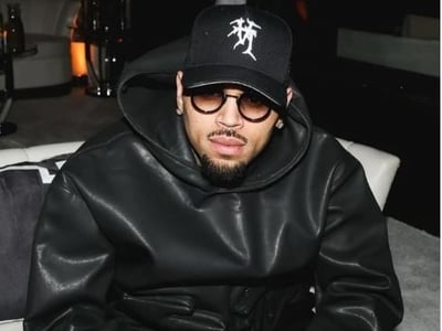 Chris Brown arrested in Manchester over alleged bottle attack