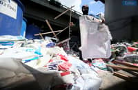 Metropolitan Manila Development Authority (MMDA) personnel collect 2025 campaign tarpaulins at a satellite office in Ortigas on Saturday, 17 May 2025. According to the MMDA, the dismantled campaign materials will be donated to their partner beneficiaries such as prisons and organizations for the disabled in Tahanan Walang Hagdan, and the environmental group EcoWaste Coalition.