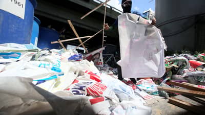Metropolitan Manila Development Authority (MMDA) personnel collect 2025 campaign tarpaulins at a satellite office in Ortigas on Saturday, 17 May 2025. According to the MMDA, the dismantled campaign materials will be donated to their partner beneficiaries such as prisons and organizations for the disabled in Tahanan Walang Hagdan, and the environmental group EcoWaste Coalition.