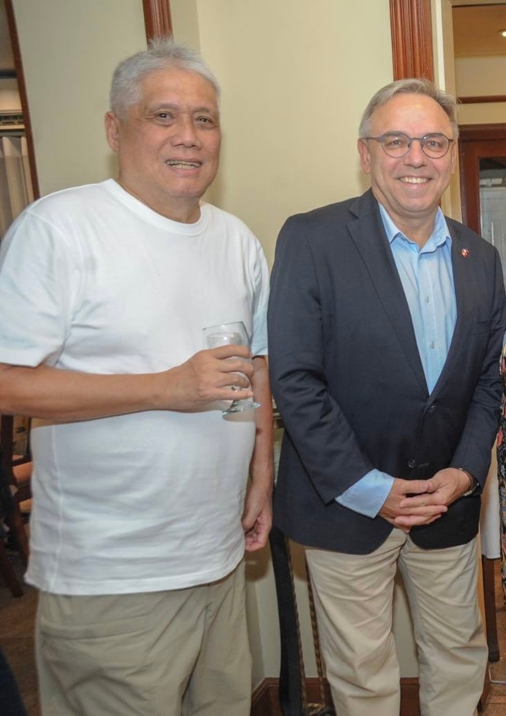 Raffy Guevara and Ambassador Nicolas Bruhl.