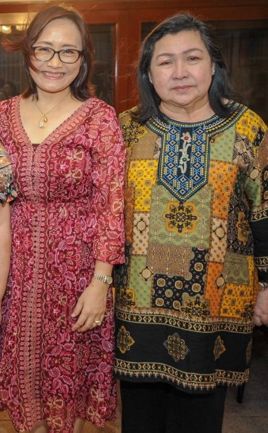Jianping Xue and Thelma Francisco.