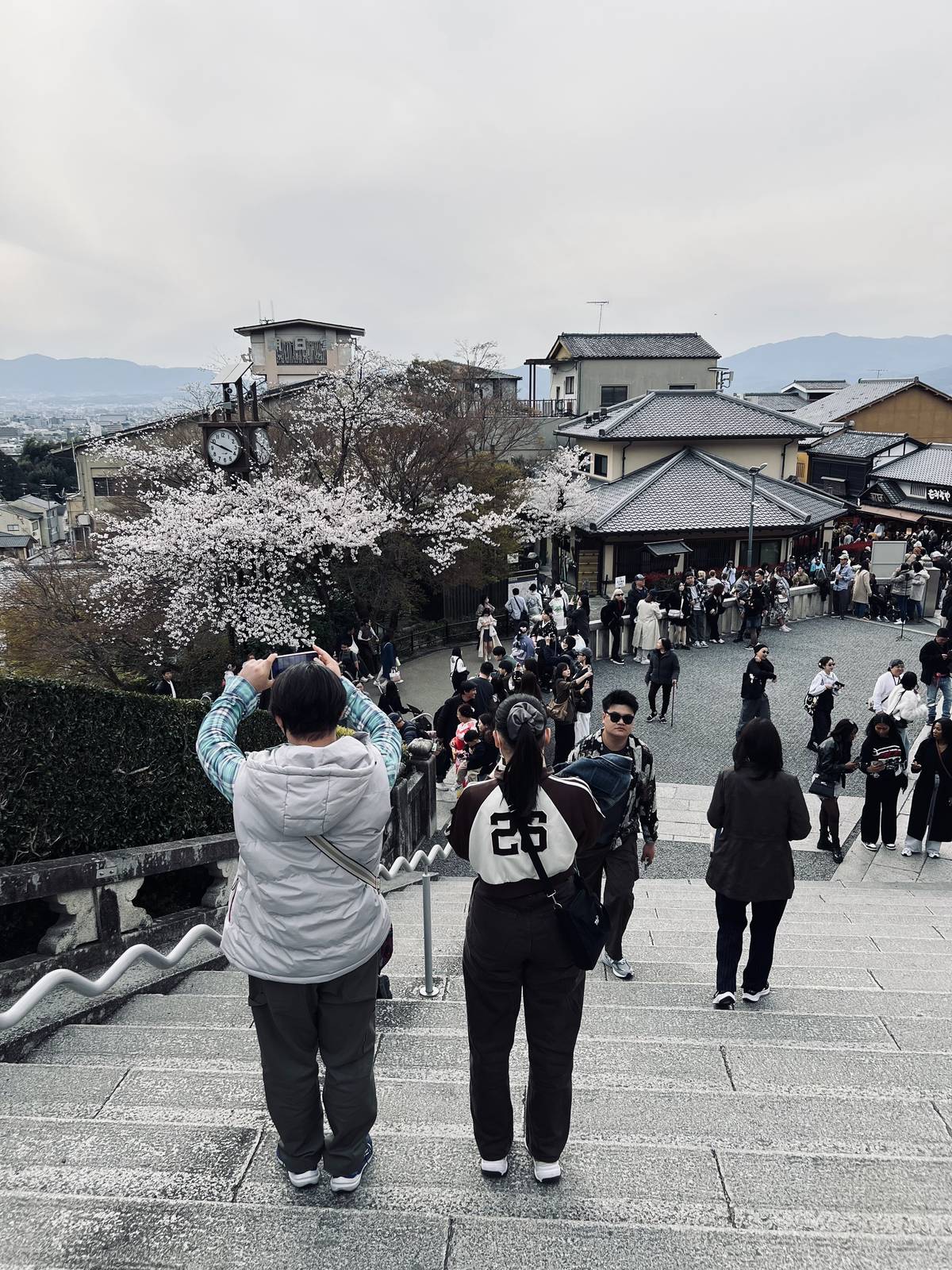 Locals and tourists alike admire the Kiyomizu-dera.