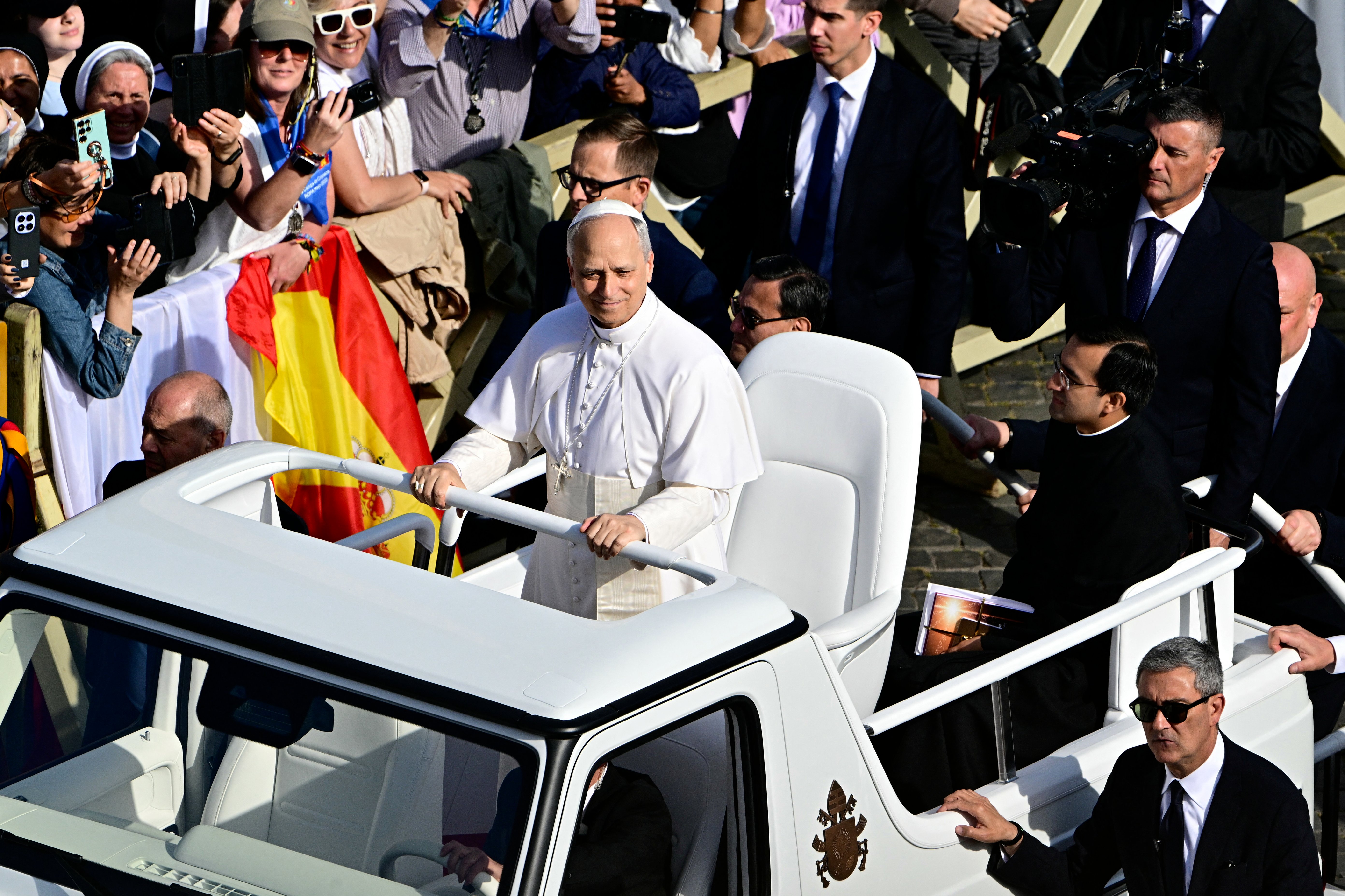     Pope Leo XIV rides popemobile before mass