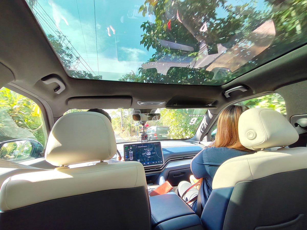 THE view from the VF 9 shows a roomy cabin, tech at your fingertips and sunlight pouring through a panoramic roof.