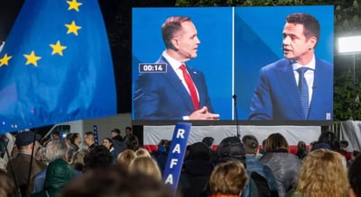 Poland votes in tight race watched across Europe