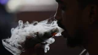 (May 19 2025) A man blow thick smoke from vape on Monday May 19 2025, Senate President vape tax adjustment to be approved when senate returns to session. Photo/Analy Labor