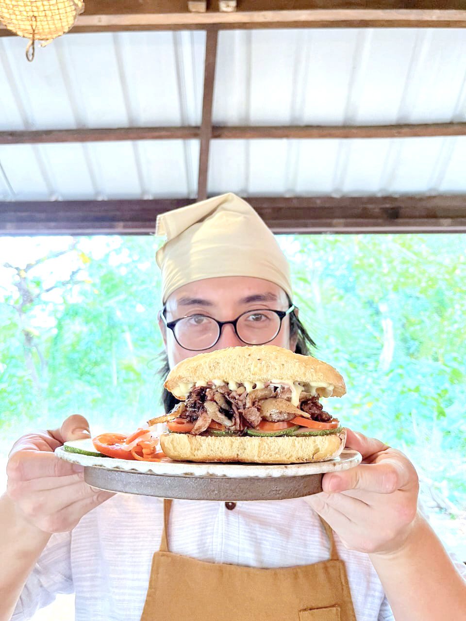 Pablo, Anak ni tito Ernie with the beef brisket sandwich.