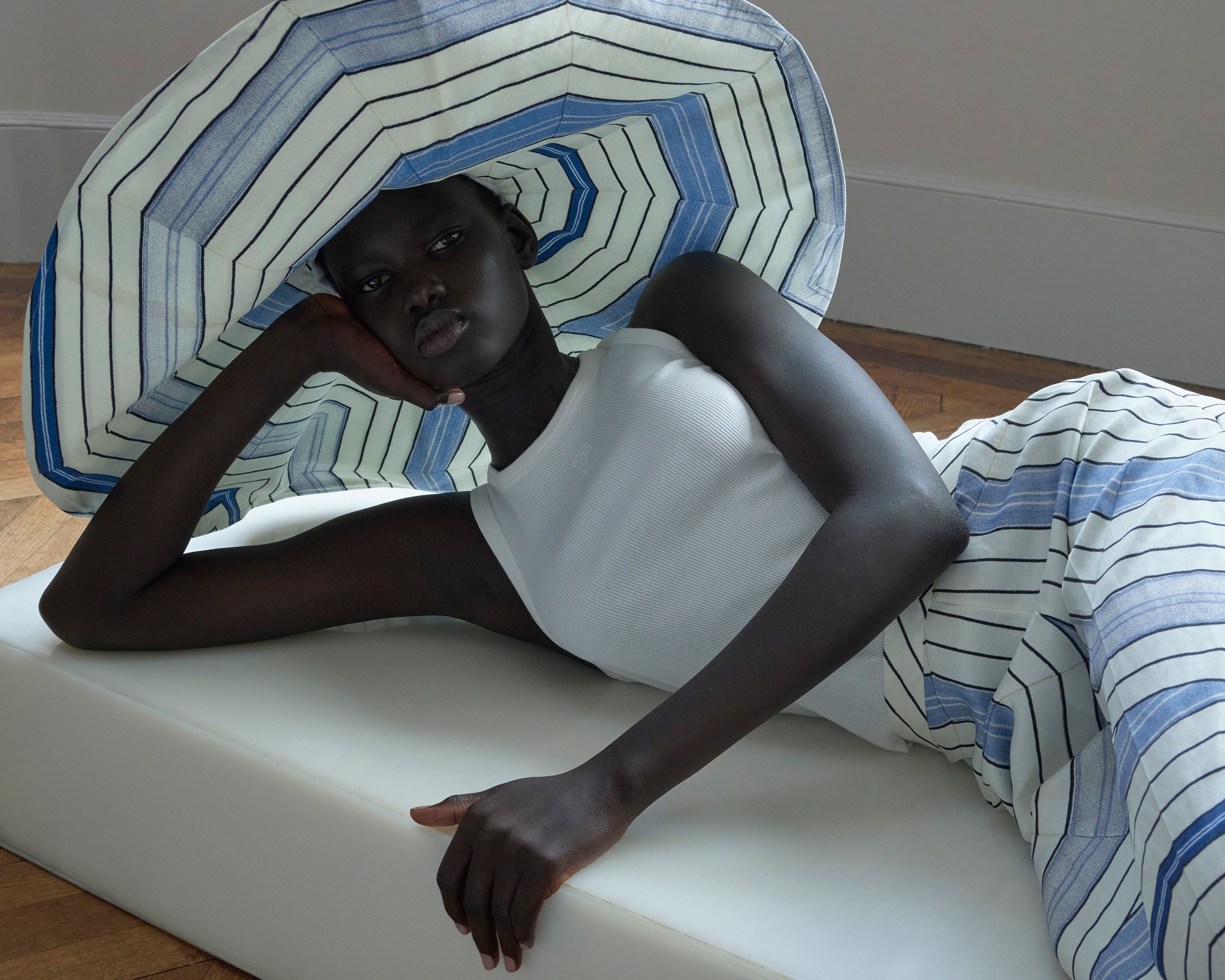THE collection celebrates women without claiming militant feminism and appreciates fashion without succumbing to the excesses of ultraconsumerism.