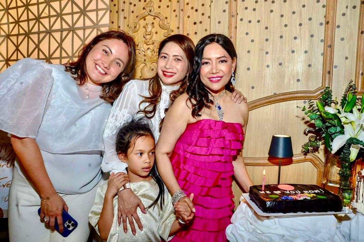 BIRTHDAY celebrator Evelyn Salazar Fraser with daughters Rona and Natalie Salazar and granddaughter.