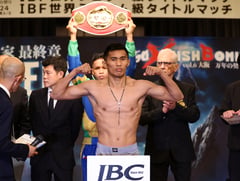 IBF champ toys with baby son