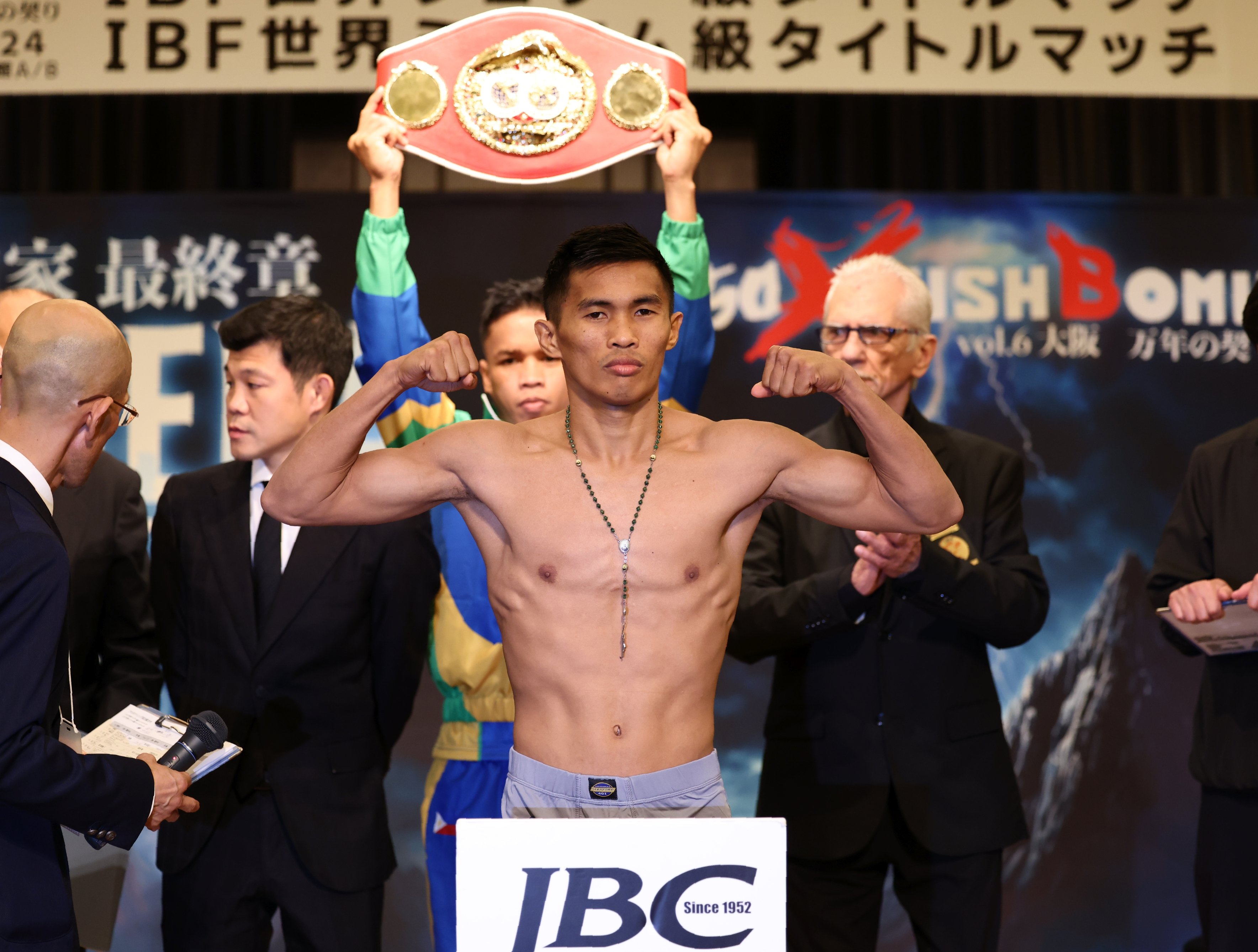 IBF champ toys with baby son