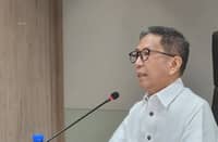 Secretary Raphael Lotilla.