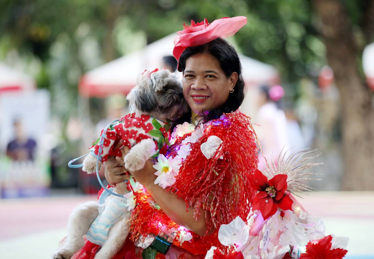 (May 24 2025) Fur parents with their pets wearing costumes to participate in the pet santacruzan parade “Furries De Mayo”. Furries de Mayo is a program that supports the welfare and promotes responsible animal care in Quezon City, hosted by the Quezon City Veterinary Department, held at Quezon City Circle on Saturday May 24 2025. Photo/Analy Labor