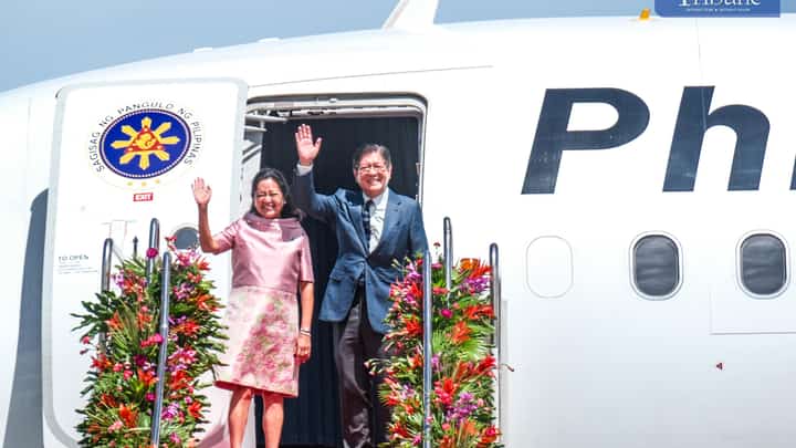 PRESIDENT Ferdinand R. Marcos Jr. and First Lady Liza Araneta-Marcos wave to well-wishers before flying for Kuala Lumpur, Malaysia.