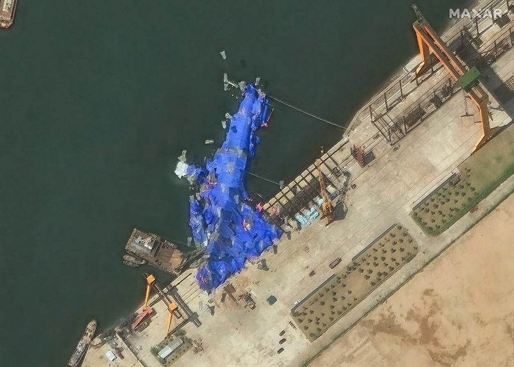 N. Korea detains three over warship launch accident: KCNA