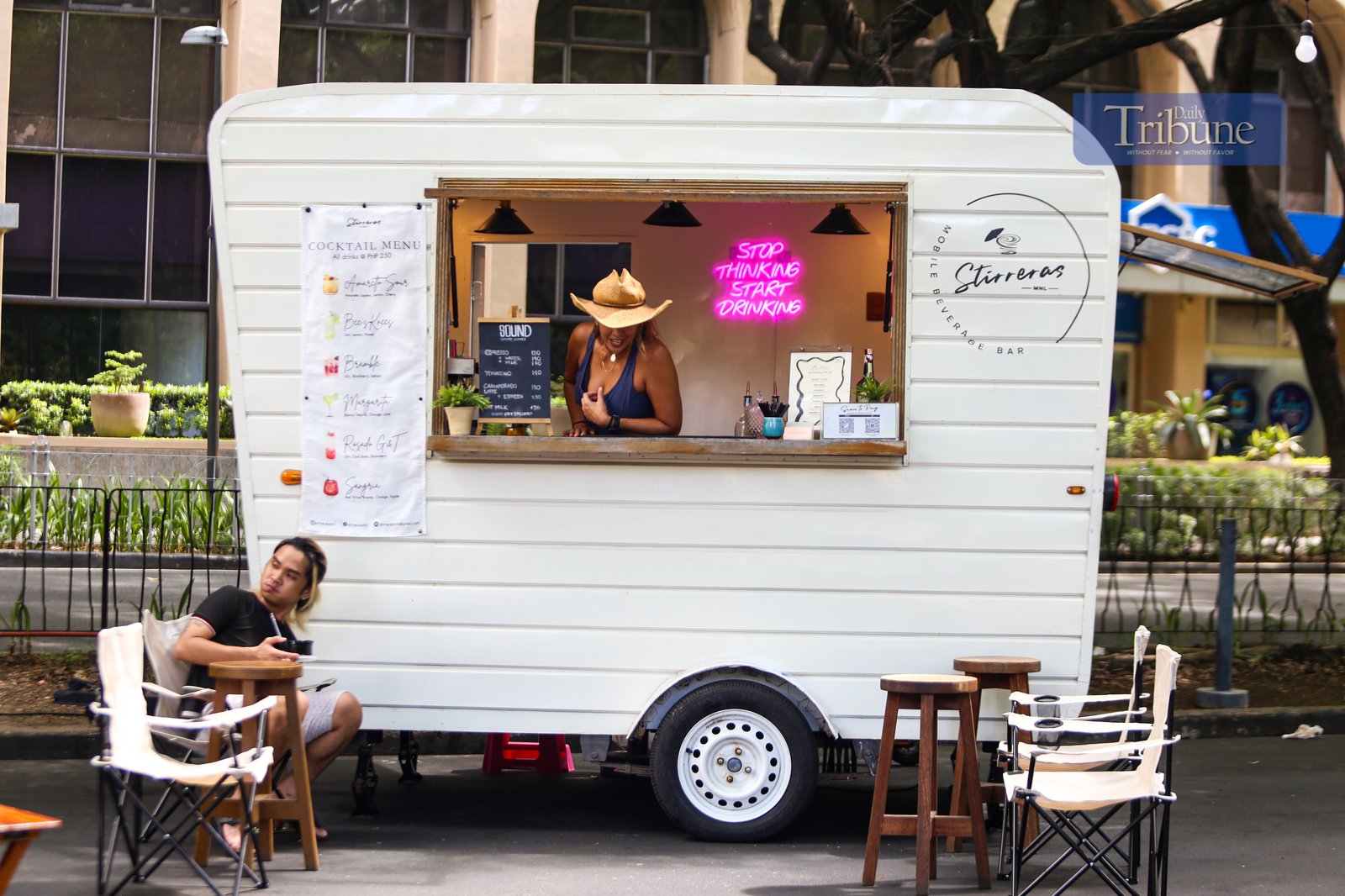 Visitors explore food and beverage stalls along Paseo de Roxas in Makati City during the Makati Street Meet presents Goût de France on the morning of 25 May 2025. The event offers a taste of French cuisine, drinks, and culture in the heart of the city.