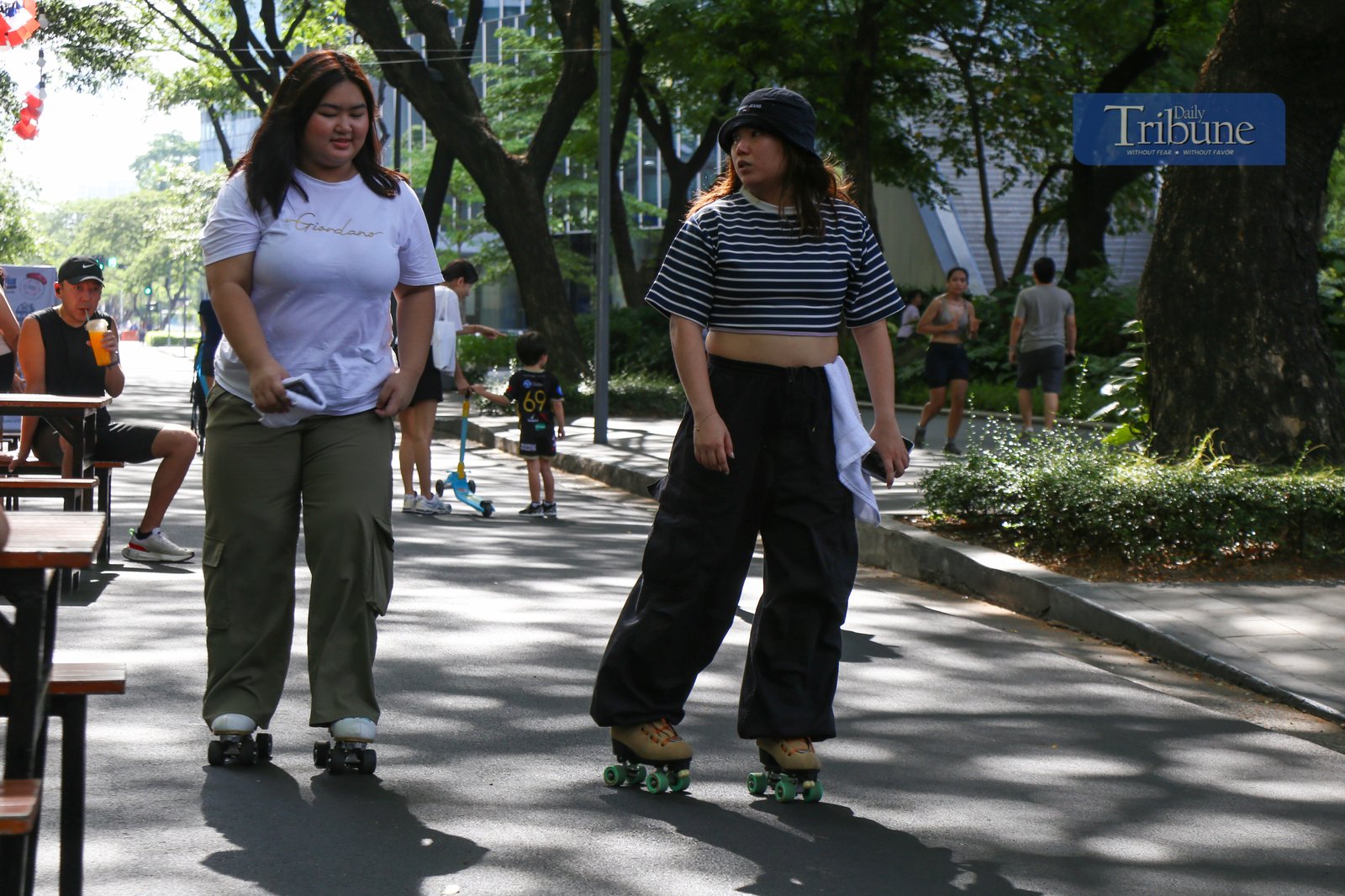 Visitors explore food and beverage stalls along Paseo de Roxas in Makati City during the Makati Street Meet presents Goût de France on the morning of 25 May 2025. The event offers a taste of French cuisine, drinks, and culture in the heart of the city.