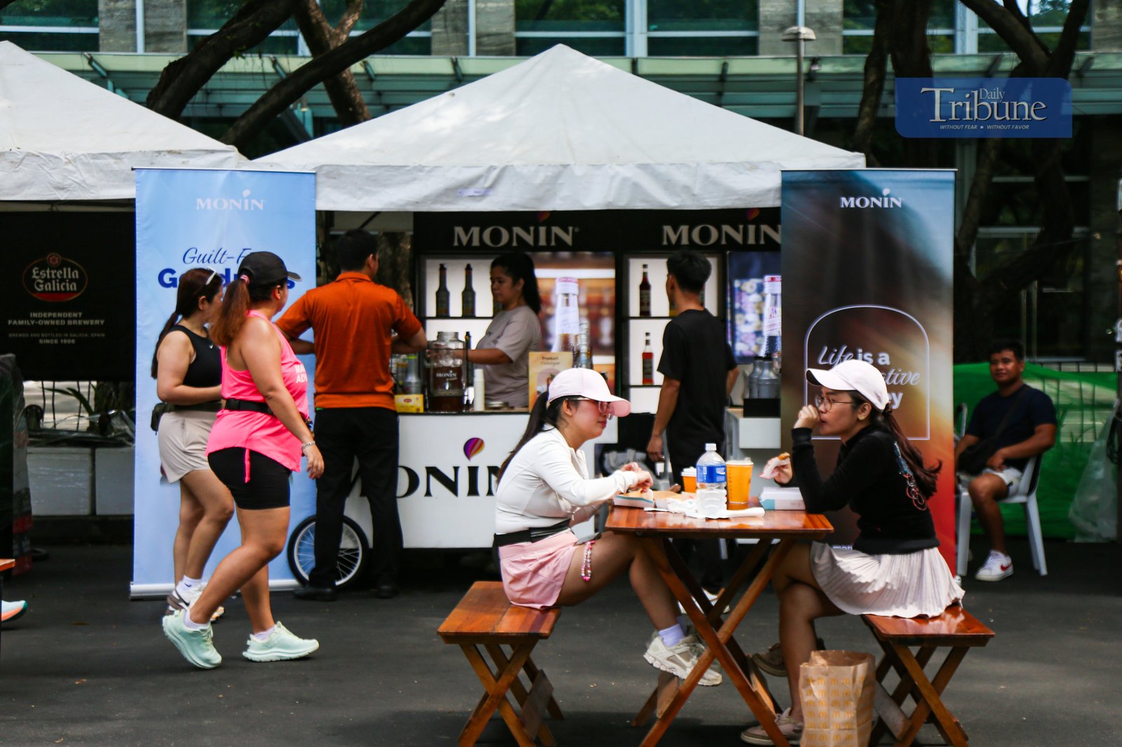 Visitors explore food and beverage stalls along Paseo de Roxas in Makati City during the Makati Street Meet presents Goût de France on the morning of 25 May 2025. The event offers a taste of French cuisine, drinks, and culture in the heart of the city.