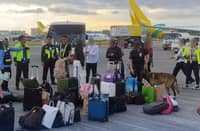 AIRPORT police and K-9 units carry out extensive explosive detection procedures at the Ninoy Aquino International Airport Terminal 3 following a bomb threat that turned out to be a hoax.