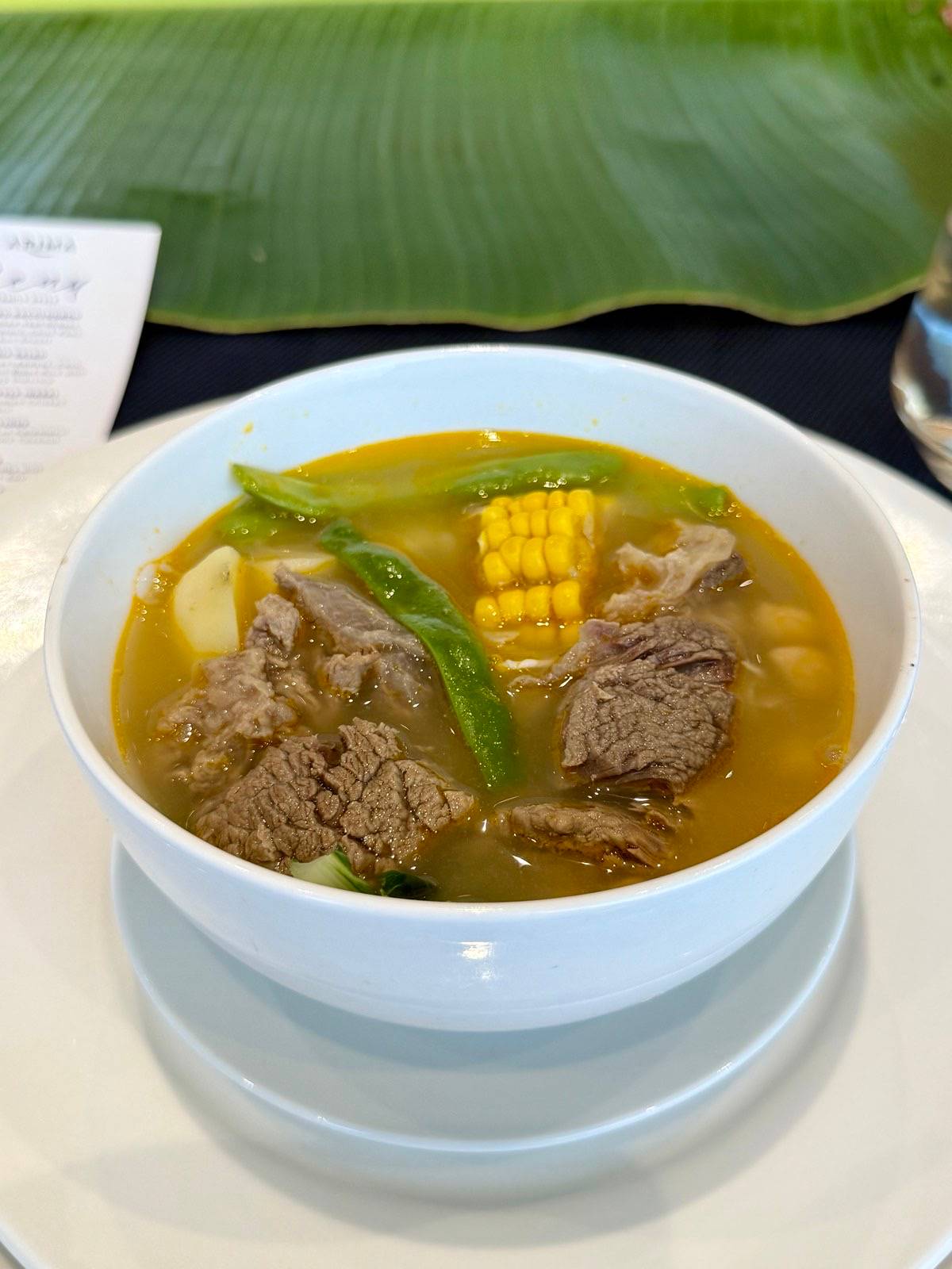 Pochero Bacolodnon — slow cooked veal shanks, banana, potato, chick peas, bamboo shoots.