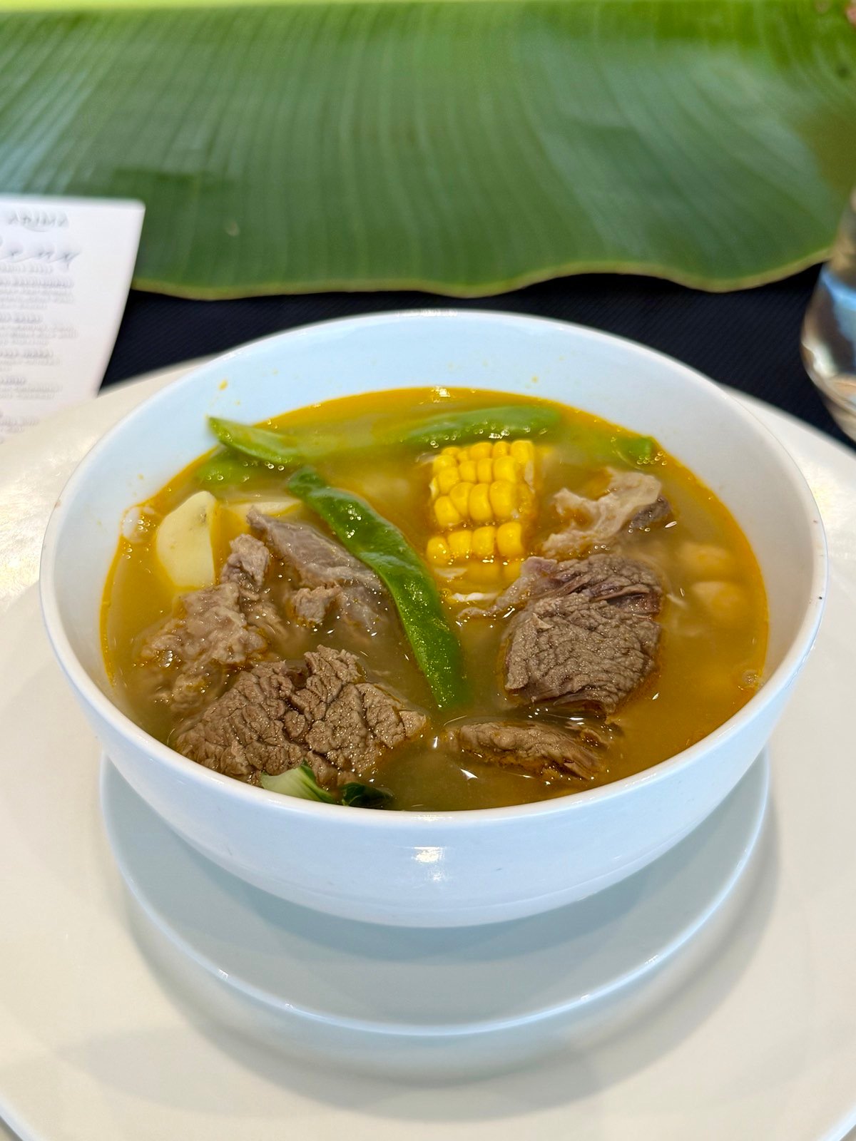 Pochero Bacolodnon — slow cooked veal shanks, banana, potato, chick peas, bamboo shoots.
