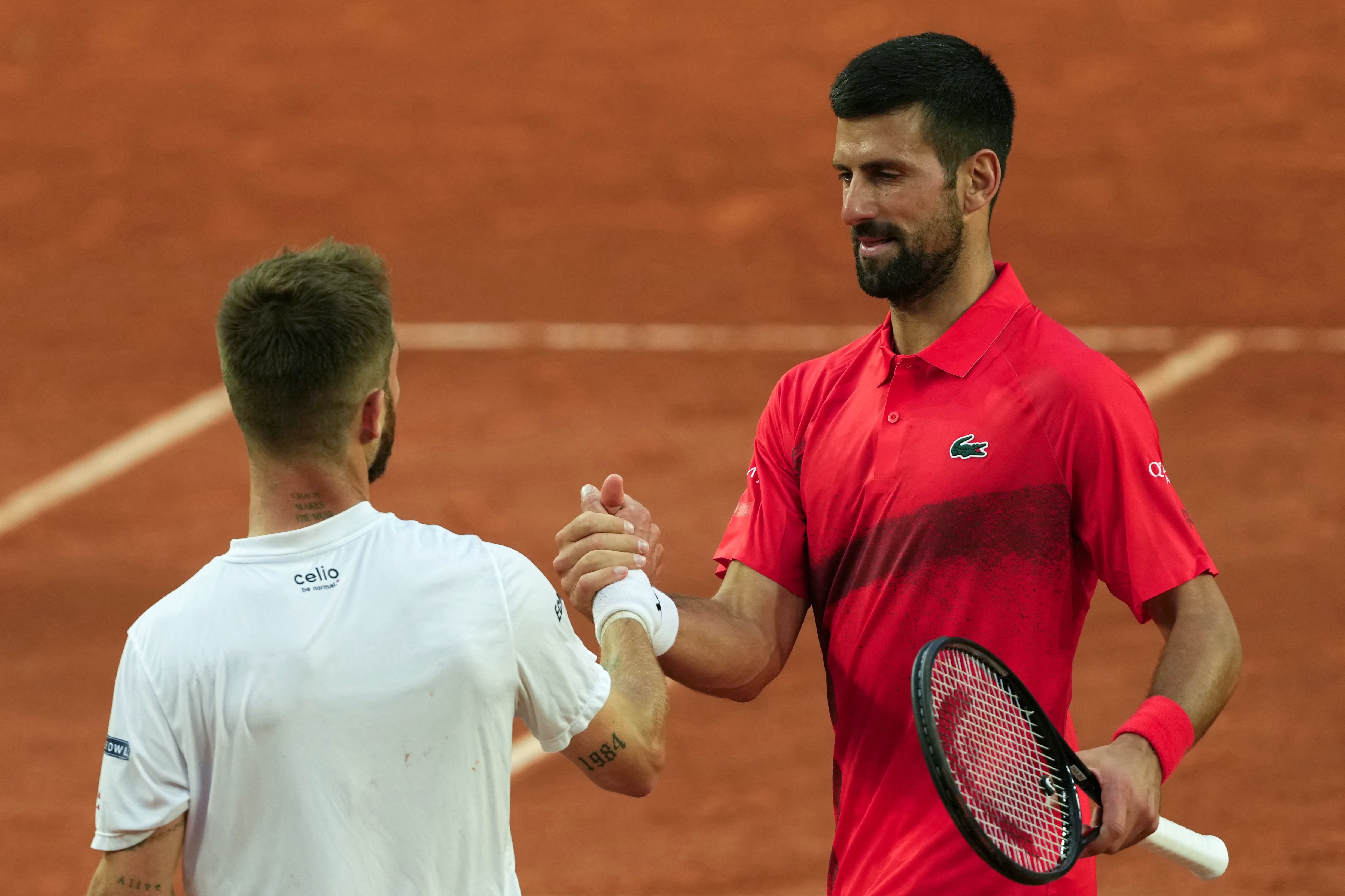 Djokovic cruises into French Open third round, stays perfect vs French foes