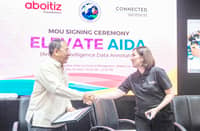 Aboitiz Foundation Inc. president Ginggay Hontiveros-Malvar (right) and Office of the Presidential Adviser on Peace, Reconciliation and Unity head and Presidential Peace Adviser Carlito G. Galvez Jr. seals a memorandum of understanding for the Elevate AIDA program at the Aboitiz Techspace of Asian Institute of Management in Makati City.