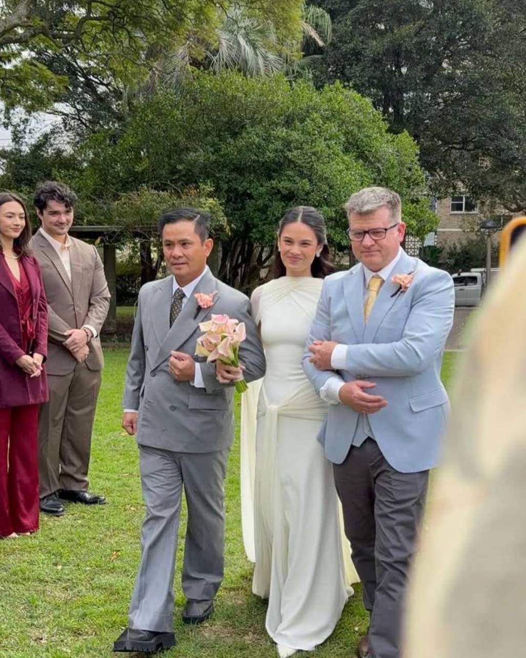 Walking the bride down the aisle.