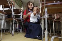 A student in Manila cries during the opening of classes last school year, the same fate for parents this coming school year, as prices of some school supplies rise, as announced by the Department of Trade and Industry on Friday.