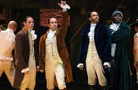 Anthony Ramos as John Laurens, Lin-Manuel Miranda as Alexander Hamilton, Daveed Diggs as the Marquis de Lafayette, and Okieriete Onaodowan as Hercules Mulligan in the filmed version of ‘Hamilton.’