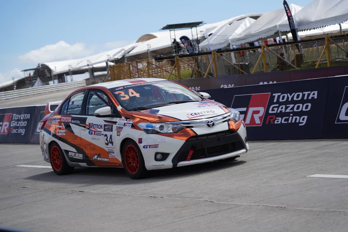 A RACER car rounds a corner past the grandstands during an early heat at the TGR Philippine Cup.