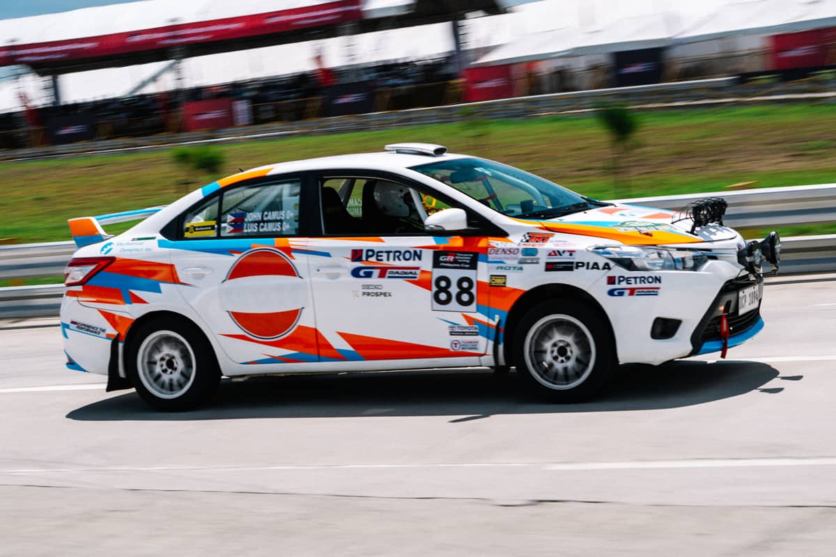 A VIOS OMR car charges through the Villar City street circuit during one of the TGR Philippine Cup’s sprint races.