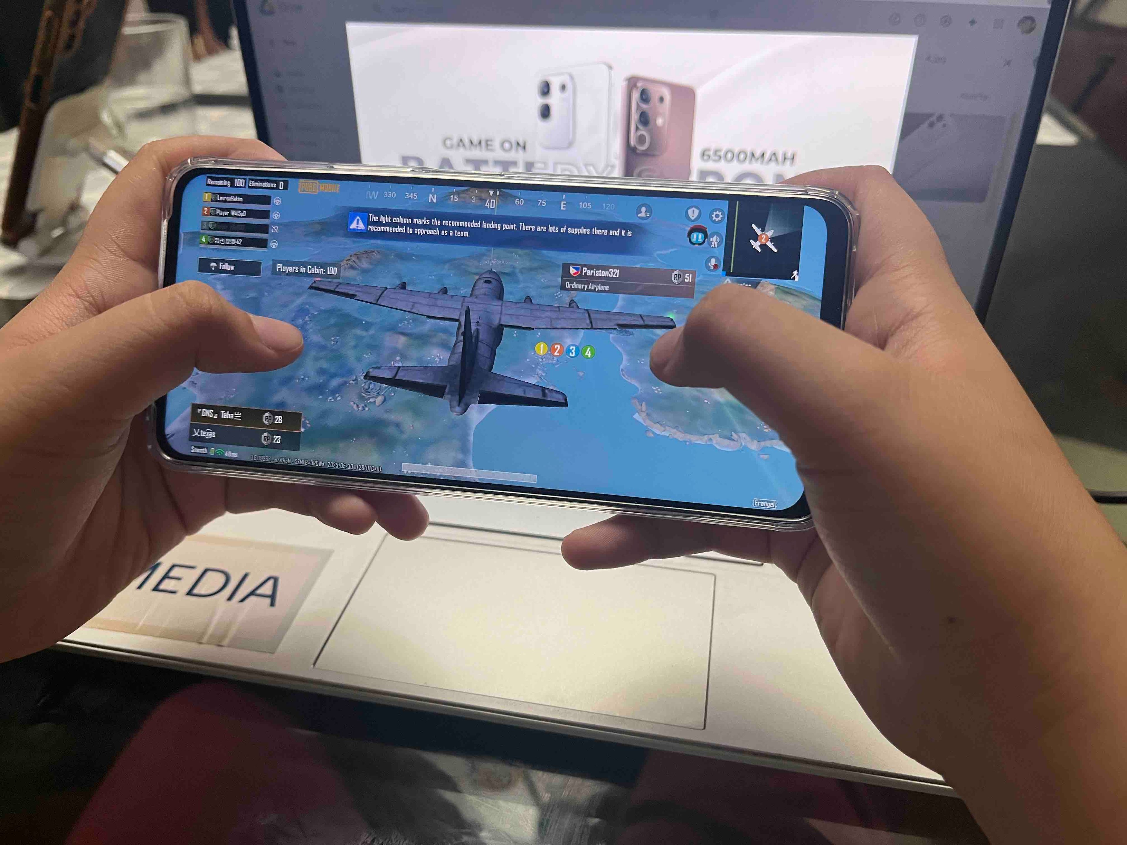 AUTHOR's nephew plays a game using the vivo Y29.