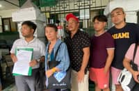 NASUGBU agrarian reform beneficiaries lawyer, Irvyn Longno (leftmost), shows the copy of the Urgent Petition for Certiorari and with Prayer for Injunction/TRO when they thronged the Court of Appeals in Manila on Friday, seeking the appellate court to nullify and void the Consolidated Order released by DAR Sec. Conrado Estrella last 2024, an issued order that will evict thousands of residents in three barangays of Nasugbu, Batangas. The said land was repossessed by the publicly-listed firm, Roxas and Company, Inc.